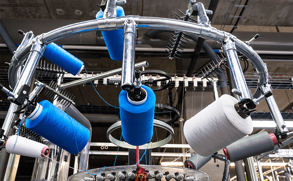 Поворотний підшипник для текстильної машини